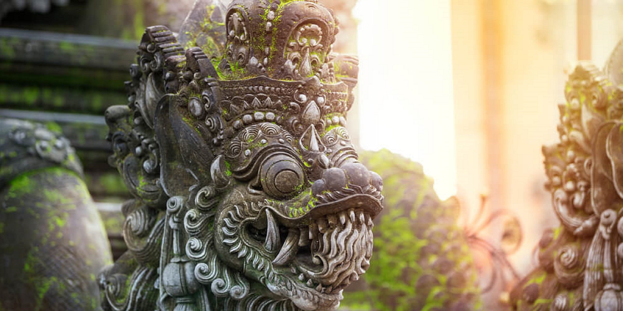 Eine traditionelle Steinfigur auf Bali bei adamare SingleReisen